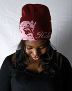 Person wearing a red helmet of salvation beanie. LOVE GOD BIG Christian clothing brand streetwear faith-based apparel.