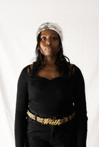 Woman wearing Belt of Truth in Leopard - Christian Belt. New Zealand. LOVE GOD BIG Christian streetwear clothing brand. Faith-based apparel.