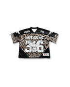 Saviour Football Jersey in Black from LOVE GOD BIG. Front flat lay. Designed in New Zealand.