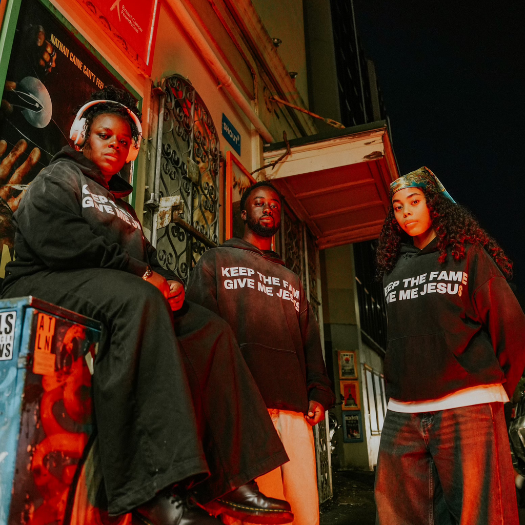 Front Black washed gradient oversized hoodie. Front pocket. 100% cotton. soft terry cotton inner. screenprinted logo "Keep the Fame Give me Jesus". Galatians 1:10. 
Model 1 wears M
Model 2 wears L
Model 3 wears S